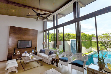 Living Area with Garden and Pool View